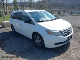 2011 Honda Odyssey EX-L with VIN 5FNRL5H69BB084277, listed as a IAAI auction lot 41986692 with 273,272 mi miles. Bid and sale history available at carsss.com. Image 1.