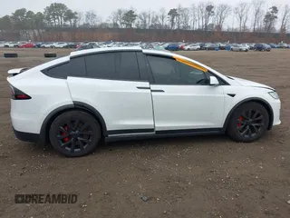 2022 Tesla Model X Plaid z VIN 7SAXCBE67NF339557, wystawiony jako IAAI lot #41825360 z przebiegiem 70 mil mil oraz . Historia ofert i sprzedaży dostępna na DreamBid. Obrazek 13.
