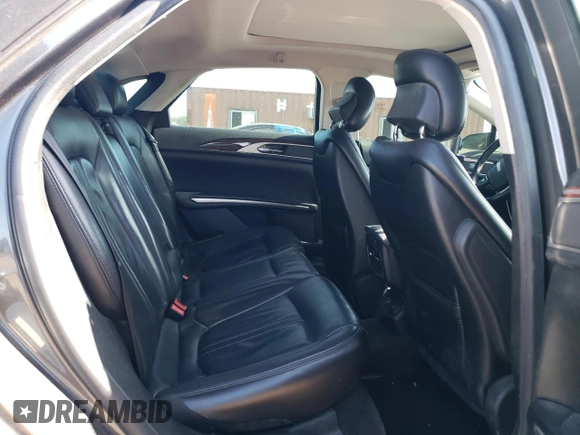2015 Lincoln MKZ Hybrid z VIN 3LN6L2LU2FR607548, wystawiony jako Copart lot #61922775 z przebiegiem 255 797 mil mil oraz Szkoda całkowita • Salvage title. Historia ofert i sprzedaży dostępna na DreamBid. Obrazek 10.