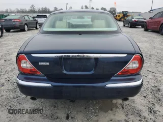 2007 Jaguar XJ Vanden Plas with VIN SAJWA82B57SH14424, listed as a Copart auction lot 45091395 with 99,242 mi miles and Salvage Title. Bid and sale history available at carsss.com. Image 6.