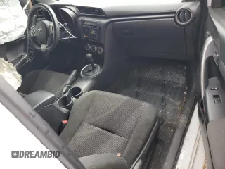 2012 Scion tC z VIN JTKJF5C71C3032427, wystawiony jako Copart lot #54160695 z przebiegiem 59 826 mil mil oraz Szkoda całkowita • Salvage title. Historia ofert i sprzedaży dostępna na DreamBid. Obrazek 8.