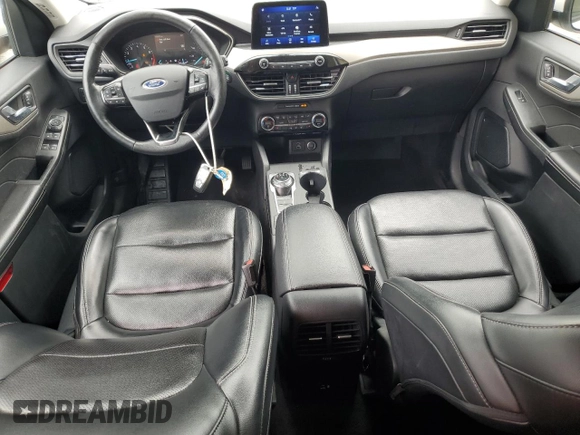 2021 Ford Escape SEL z VIN 1FMCU9H64MUA51011, wystawiony jako Copart lot #58241615 z przebiegiem 100 075 mil mil oraz Czysty tytuł • Clean title. Historia ofert i sprzedaży dostępna na DreamBid. Obrazek 8.