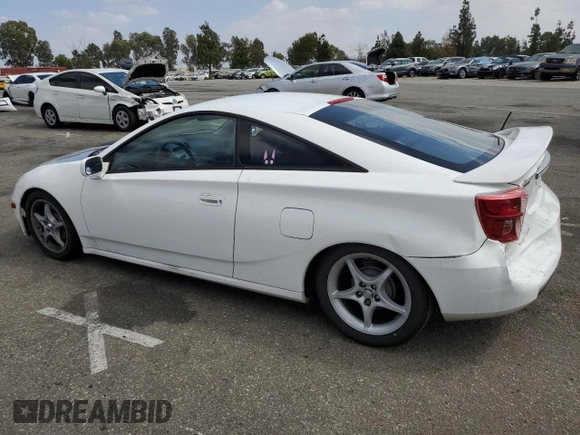 2004 Toyota Celica GT with VIN JTDDR32TX40174017, listed as a Copart auction lot 73748694 with 138,701 mi miles and Salvage Title. Bid and sale history available at DreamBid. Image 2.