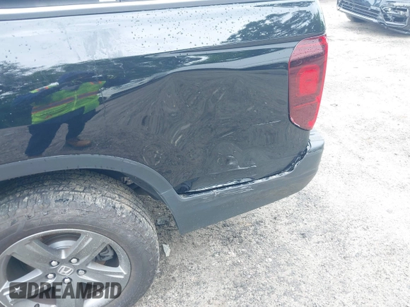2023 Honda Ridgeline RTL-E with VIN 5FPYK3F77PB052828, listed as a IAAI auction lot 42366947 with 24,658 mi miles and . Bid and sale history available at DreamBid. Image 17.