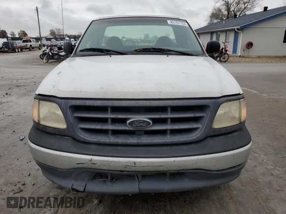 2000 Ford F-150 XL с VIN 1FTRF17W2YKA55667, выставлен на аукционе Copart как лот 83191704 с пробегом Не указан миль и Списание • Salvage title. История ставок и продаж доступна на DreamBid. Изображение 5.