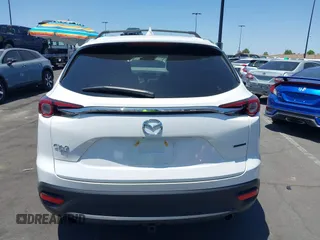 2023 Mazda CX-9 Touring Plus with VIN JM3TCBAY7P0636047, listed as a IAAI auction lot 42309618 with 20,821 mi miles and . Bid and sale history available at DreamBid. Image 16.