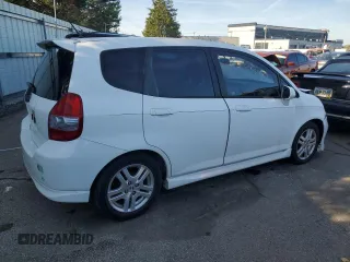 2007 Honda Fit Sport with VIN JHMGD386X7S048180, listed as a Copart auction lot 74252494 with 112,828 mi miles and Salvage Title. Bid and sale history available at carsss.com. Image 3.