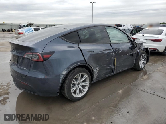 2023 Tesla Model Y Long Range with VIN 7SAYGDEE3PA151887, listed as a Copart auction lot 51459495 with 15,562 mi miles and Salvage Title. Bid and sale history available at DreamBid. Image 3.