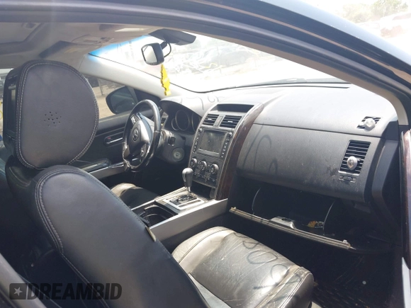 2012 Mazda CX-9 Grand Touring with VIN JM3TB3DA7C0348806, listed as a IAAI auction lot 42608518 with 229,337 mi miles and . Bid and sale history available at DreamBid. Image 5.