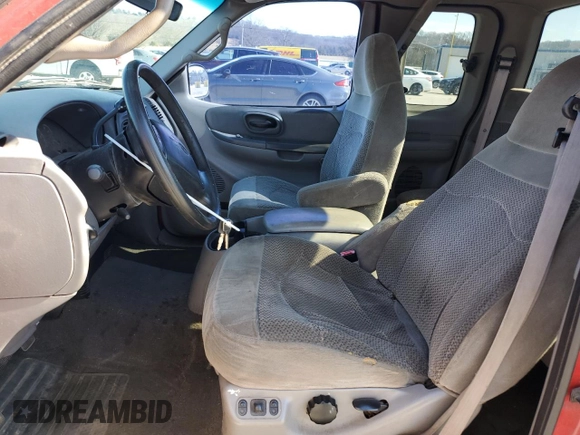 2000 Ford F-150 XL with VIN 1FTRX17L0YNA51439, listed as a Copart auction lot 44056595 with 242,116 mi miles and Clean Title. Bid and sale history available at carsss.com. Image 7.
