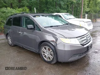 2011 Honda Odyssey EX-L with VIN 5FNRL5H66BB078100, listed as a IAAI auction lot 42518675 with 174,401 mi miles and . Bid and sale history available at DreamBid. Image 1.