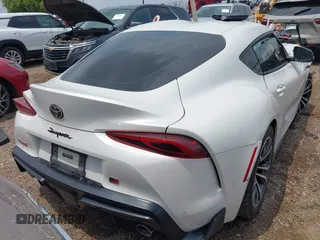2021 Toyota Supra 2.0 with VIN WZ1DB2C0XMW043249, listed as a IAAI auction lot 42085092 with Not provided miles and . Bid and sale history available at DreamBid. Image 4.