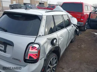 2019 MINI Hardtop 4 Door Cooper S with VIN WMWXU3C59K2H87159, listed as a IAAI auction lot 41225965 with 76,640 mi miles. Bid and sale history available at carsss.com. Image 4.