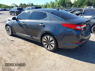 2011 Kia Optima SX z VIN KNAGR4A60B5126988, wystawiony jako IAAI lot #42313244 z przebiegiem 152 661 mil mil oraz . Historia ofert i sprzedaży dostępna na DreamBid. Obrazek 3.