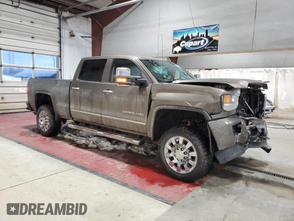 2015 GMC Sierra 2500HD Denali with VIN 1GT120EG6FF619065, listed as a Copart auction lot 83321254 with 120,628 mi miles and Salvage title. Bid and sale history available at DreamBid. Image 4.