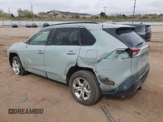 2020 Toyota RAV4 Hybrid XLE with VIN 2T3RWRFV2LW057300, listed as a Copart auction lot 54762655 with 96,624 mi miles and Salvage title. Bid and sale history available at DreamBid. Image 2.