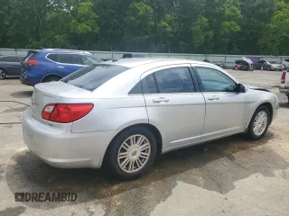 2009 Chrysler Sebring Touring z VIN 1C3LC56B39N501219, wystawiony jako Copart lot #56197905 z przebiegiem 138 442 mil mil oraz Szkoda całkowita • Salvage title. Historia ofert i sprzedaży dostępna na DreamBid. Obrazek 3.