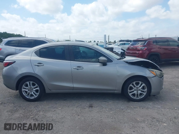 2016 Scion iA z VIN 3MYDLBZV4GY133476, wystawiony jako IAAI lot #42115431 z przebiegiem 112 087 mil mil oraz . Historia ofert i sprzedaży dostępna na DreamBid. Obrazek 13.