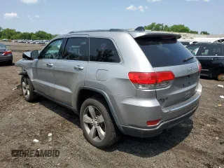 2014 Jeep Grand Cherokee Limited with VIN 1C4RJFBG9EC501136, listed as a Copart auction lot 59873595 with 203,819 mi miles and Salvage title. Bid and sale history available at DreamBid. Image 2.