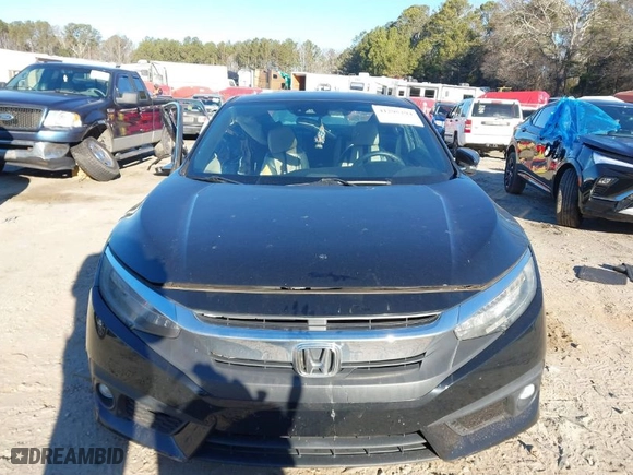 2016 Honda Civic Coupe Touring with VIN 2HGFC3B96GH357012, listed as a IAAI auction lot 41295294 with NaN miles. Bid and sale history available at carsss.com. Image 13.