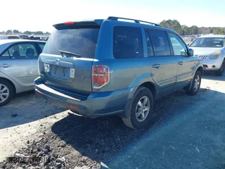 2008 Honda Pilot EX-L with VIN 5FNYF28528B018817, listed as a IAAI auction lot 41608185 with 206,094 mi miles. Bid and sale history available at carsss.com. Image 4.