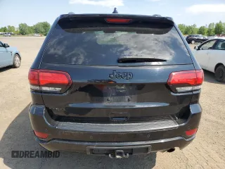 2019 Jeep Grand Cherokee Altitude with VIN 1C4RJFAG5KC813144, listed as a Copart auction lot 62295595 with 140,986 mi miles and Salvage title. Bid and sale history available at DreamBid. Image 6.