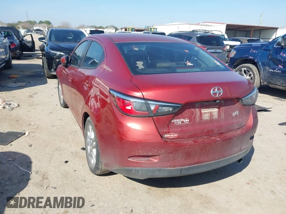 2016 Scion iA with VIN 3MYDLBZVXGY108176, listed as a IAAI auction lot 41590603 with 227,001 mi miles. Bid and sale history available at carsss.com. Image 3.