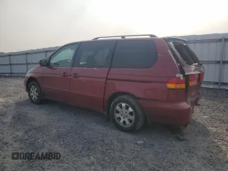 2004 Honda Odyssey EX-L with VIN 5FNRL18024B008617, listed as a Copart auction lot 58831435 with Not provided miles and Salvage title. Bid and sale history available at DreamBid. Image 2.