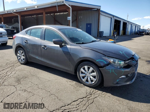 2015 Mazda 3 i Sport z VIN 3MZBM1U70FM215164, wystawiony jako Copart lot #57527785 z przebiegiem 144 621 mil mil oraz Szkoda całkowita • Salvage title. Historia ofert i sprzedaży dostępna na DreamBid. Obrazek 4.
