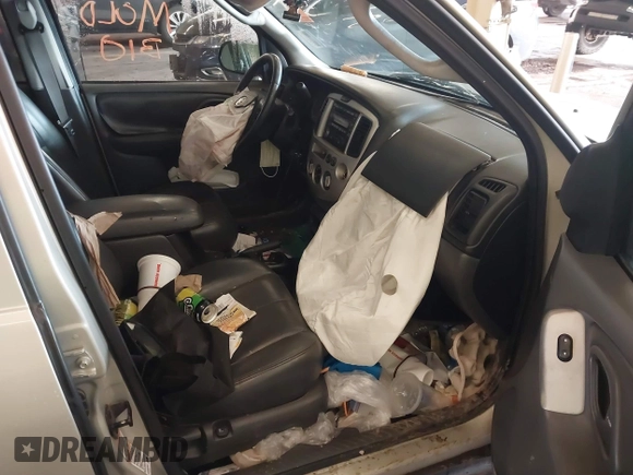 2004 Mazda Tribute ES with VIN 4F2CZ96104KM03252, listed as a IAAI auction lot 41153343 with 204,621 mi miles and . Bid and sale history available at carsss.com. Image 5.