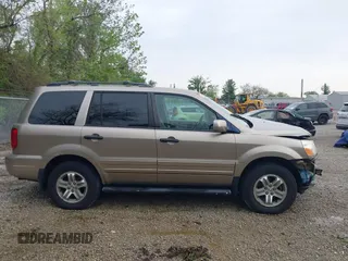 2005 Honda Pilot EX-L z VIN 2HKYF187X5H548431, wystawiony jako IAAI lot #42202692 z przebiegiem 199 889 mil mil oraz . Historia ofert i sprzedaży dostępna na DreamBid. Obrazek 14.
