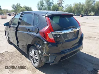 2015 Honda Fit EX-L z VIN 3HGGK5H88FM706513, wystawiony jako IAAI lot #42493772 z przebiegiem 173 129 mil mil oraz . Historia ofert i sprzedaży dostępna na DreamBid. Obrazek 3.