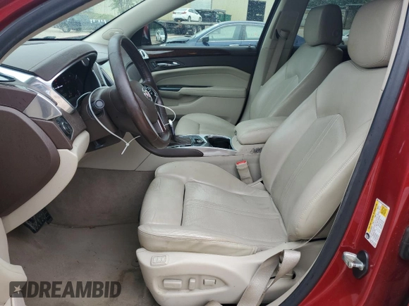 2014 Cadillac SRX Performance Collection z VIN 3GYFNCE32ES560497, wystawiony jako Copart lot #53107835 z przebiegiem 140 378 mil mil oraz Szkoda całkowita • Salvage title. Historia ofert i sprzedaży dostępna na DreamBid. Obrazek 7.