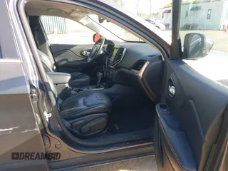 2015 Jeep Cherokee Limited with VIN 1C4PJMDB4FW610956, listed as a IAAI auction lot 42167270 with 118,219 mi miles and . Bid and sale history available at DreamBid. Image 5.