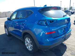 2019 Hyundai Tucson Value with VIN KM8J33A47KU966447, listed as a IAAI auction lot 41631458 with 46,519 mi miles. Bid and sale history available at carsss.com. Image 3.