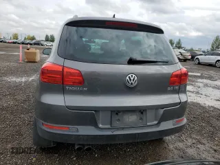 2017 Volkswagen Tiguan with VIN WVGHV7AX1HK017717, listed as a Copart auction lot 64948373 with 77,825 mi miles and Salvage title. Bid and sale history available at DreamBid. Image 6.
