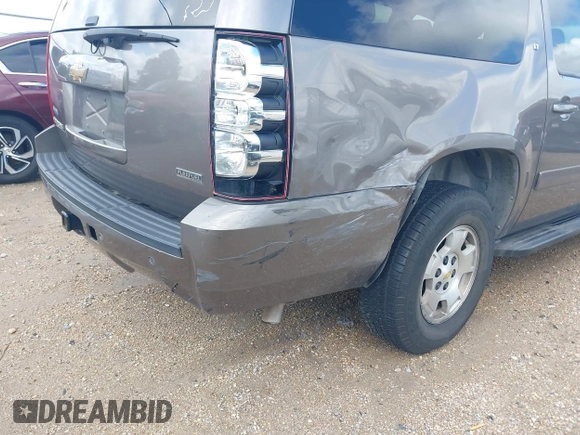 2011 Chevrolet Suburban LT with VIN 1GNSKJE37BR337895, listed as a IAAI auction lot 42171238 with 228,327 mi miles and . Bid and sale history available at DreamBid. Image 6.