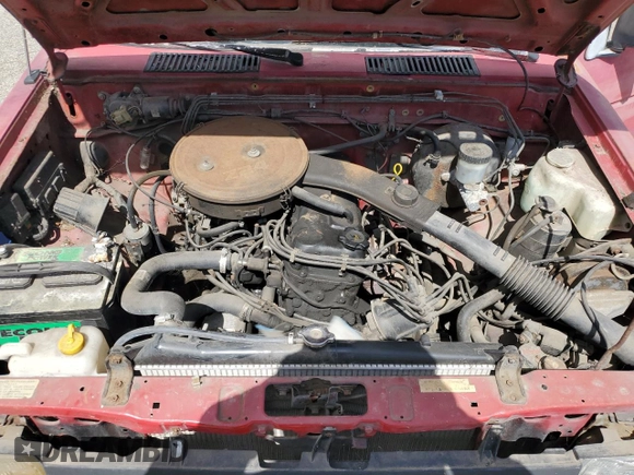 1986 Nissan Hardbody E с VIN JN6ND11SXGW022401, выставлен на аукционе Copart как лот 51545335 с пробегом 187 680 миль миль и Чистый • Clean title. История ставок и продаж доступна на DreamBid. Изображение 11.