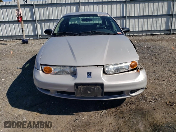 2001 Saturn SL z VIN 1G8ZK54701Z301199, wystawiony jako Copart lot #48488335 z przebiegiem 96 151 mil mil oraz Szkoda całkowita • Salvage title. Historia ofert i sprzedaży dostępna na DreamBid. Obrazek 5.