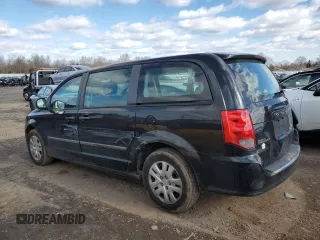 2014 Dodge Grand Caravan SE with VIN 2C4RDGBG0ER136799, listed as a Copart auction lot 45430905 with 148,309 mi miles and Clean Title. Bid and sale history available at DreamBid. Image 2.