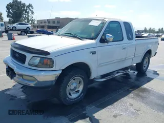 1998 Ford F-150 with VIN 1FTRX18L8WKA86341, listed as a IAAI auction lot 42222043 with 315,734 mi miles and . Bid and sale history available at DreamBid. Image 2.