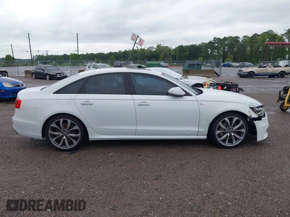 2013 Audi A6 Prestige with VIN WAUHGAFC2DN153202, listed as a IAAI auction lot 42242052 with 163,295 mi miles and . Bid and sale history available at DreamBid. Image 13.