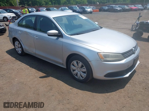 2012 Volkswagen Jetta SE z VIN 3VWDP7AJ5CM309927, wystawiony jako IAAI lot #42414951 z przebiegiem 128 109 mil mil oraz . Historia ofert i sprzedaży dostępna na DreamBid. Obrazek 1.