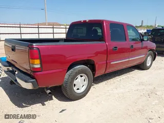 2004 GMC Sierra 1500 Crew Cab SLT with VIN 2GTEC13T841320704, listed as a IAAI auction lot 42015057 with 290,751 mi miles. Bid and sale history available at carsss.com. Image 4.
