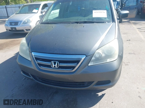 2007 Honda Odyssey EX-L with VIN 5FNRL38777B140916, listed as a IAAI auction lot 42159976 with 167,541 mi miles. Bid and sale history available at carsss.com. Image 6.