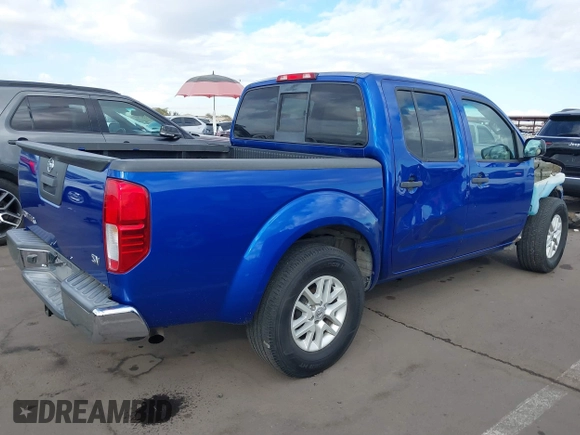 2014 Nissan Frontier SV with VIN 1N6AD0ER1EN765693, listed as a IAAI auction lot 41560914 with 165,572 mi miles and . Bid and sale history available at DreamBid. Image 4.
