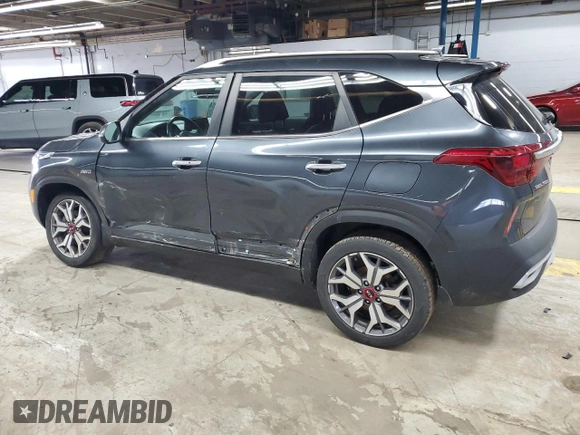 2021 Kia Seltos SX with VIN KNDETCA2XM7167199, listed as a Copart auction lot 52080495 with 82,981 mi miles and Salvage Title. Bid and sale history available at carsss.com. Image 2.