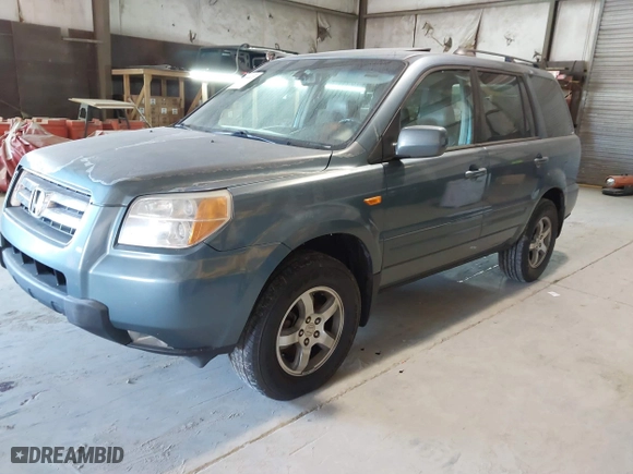 2007 Honda Pilot EX-L with VIN 5FNYF28647B004098, listed as a IAAI auction lot 41404472 with 319,747 mi miles. Bid and sale history available at carsss.com. Image 2.