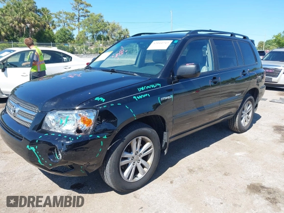 2007 Toyota Highlander Hybrid with VIN JTEHW21A970039728, listed as a IAAI auction lot 42044242 with 200,798 mi miles. Bid and sale history available at carsss.com. Image 2.