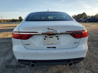 2016 Jaguar XF 35t Prestige with VIN SAJBE4BV6GCY07059, listed as a Copart auction lot 80450974 with 65,981 mi miles and Salvage Title. Bid and sale history available at carsss.com. Image 6.